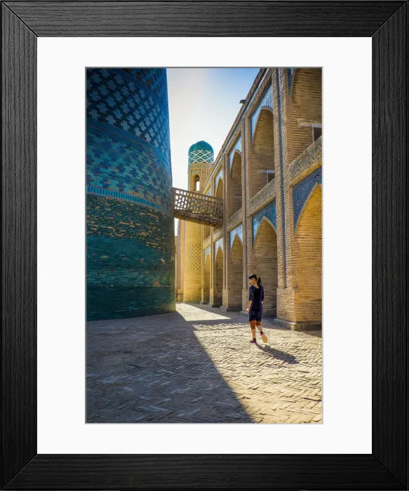 Framed Print : Kalta Minor minaret, Khiva. Uzbekistan, Central Asia. Woman walking near the minaret Framed Print : Kalta Minor minaret, Khiva. Uzbekistan, Central Asia. Woman walking near the minaret
