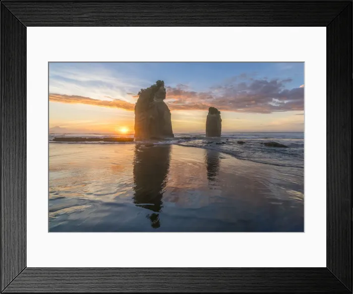 Framed Print : The sun in setting down behind the Three Sisters. Tongaporutu, New Plymouth district Framed Print : The sun in setting down behind the Three Sisters. Tongaporutu, New Plymouth district