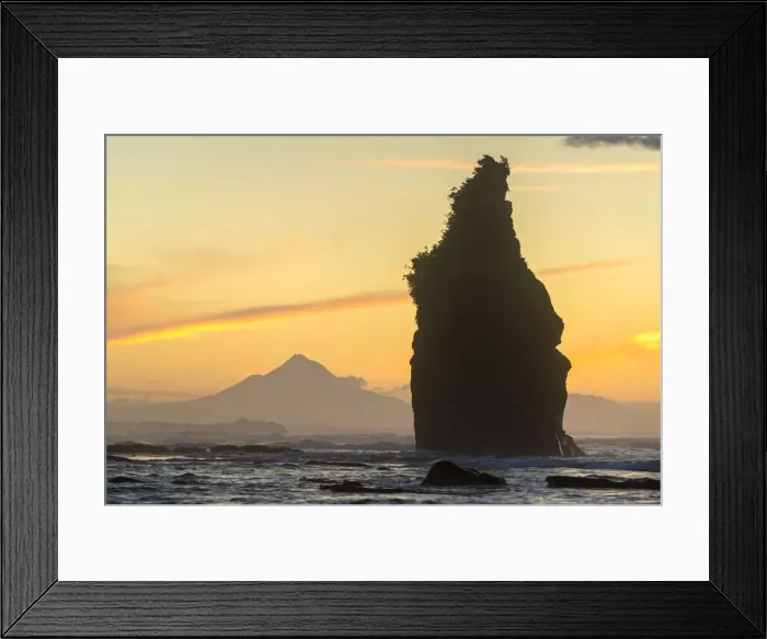 Framed Print : Sunset at the Three Sisters, with Mount Taranaki in the background Framed Print : Sunset at the Three Sisters, with Mount Taranaki in the background