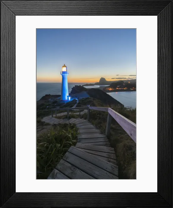 Framed Print : Castlepoint lighthouse lit in blue at dusk. Castlepoint, Wairarapa region, North Island Framed Print : Castlepoint lighthouse lit in blue at dusk. Castlepoint, Wairarapa region, North Island