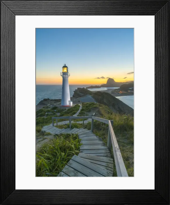 Framed Print : Castlepoint lighthouse lit at dusk. Castlepoint, Wairarapa region, North Island, New Framed Print : Castlepoint lighthouse lit at dusk. Castlepoint, Wairarapa region, North Island, New