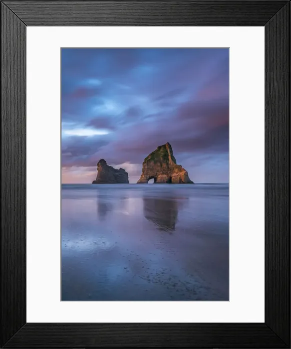 Framed Print : Sunset clouds above Archway Islands. Wharariki beach, Puponga, Tasman district, South Framed Print : Sunset clouds above Archway Islands. Wharariki beach, Puponga, Tasman district, South