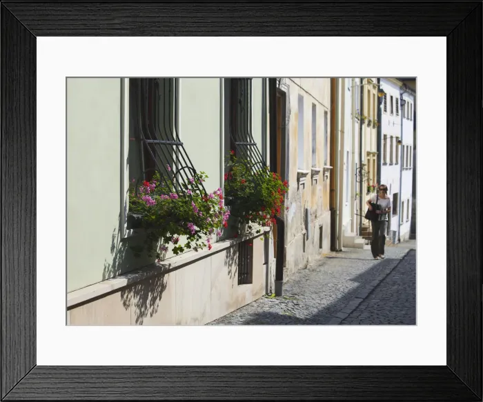 Framed Print : Czech Republic, Moravia, Olomouc, Woman Walking Along Street With Colourful Houses Framed Print : Czech Republic, Moravia, Olomouc, Woman Walking Along Street With Colourful Houses