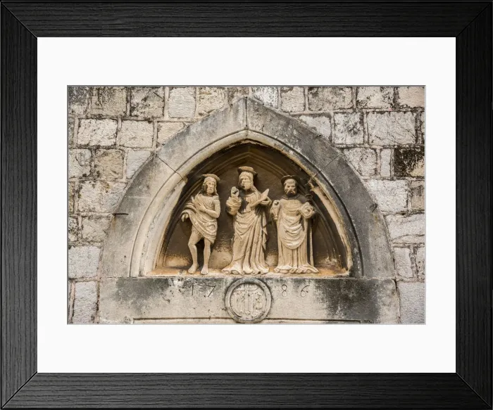 Framed Print : The three saints statues carved above the entrance door of Church of St Luke, Dubrovnik Framed Print : The three saints statues carved above the entrance door of Church of St Luke, Dubrovnik