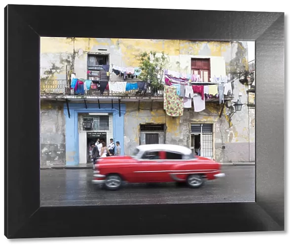 classic american car passes old buildings, Havana, la habana, Cuba