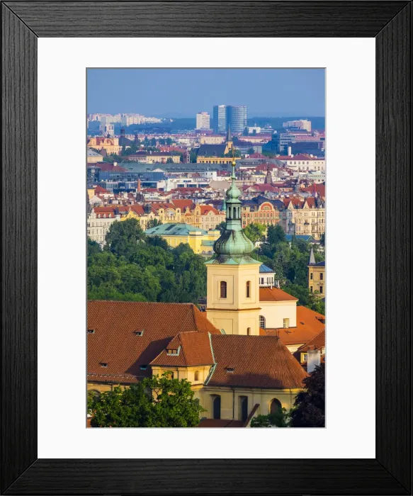 Framed Print : Czech Republic, Prague. Steeple of Church of Our Lady Victorious and buildings in Framed Print : Czech Republic, Prague. Steeple of Church of Our Lady Victorious and buildings in