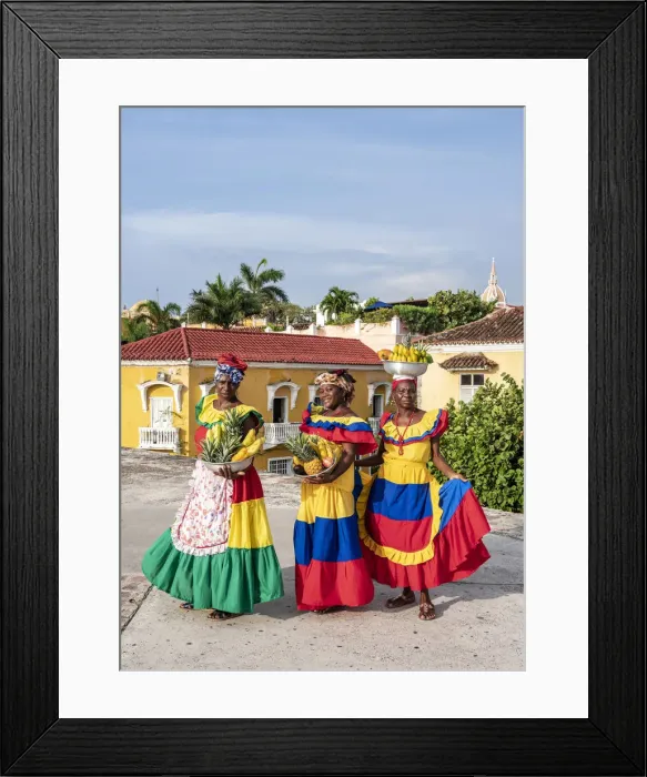 Framed Print : Colourful Palenqueras selling fruits on the walls of Cartagena, Bolivar Department Framed Print : Colourful Palenqueras selling fruits on the walls of Cartagena, Bolivar Department
