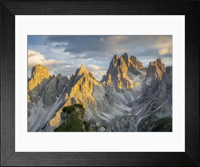Framed Print : Italy, Veneto, Belluno district, Auronzo di Cadore, sunset over the many spiers that shape Framed Print : Italy, Veneto, Belluno district, Auronzo di Cadore, sunset over the many spiers that shape
