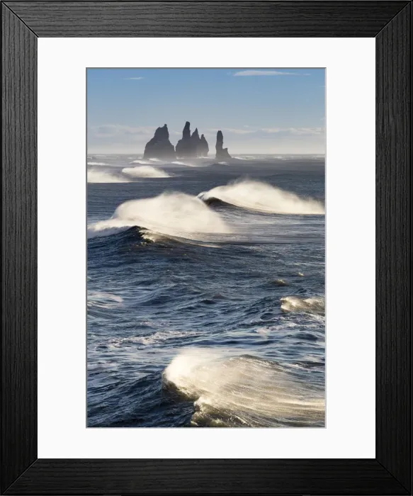 Framed Print : Waves moving to Reynisfjara beach, with the Reynisdrangar sea stacks on the horizon