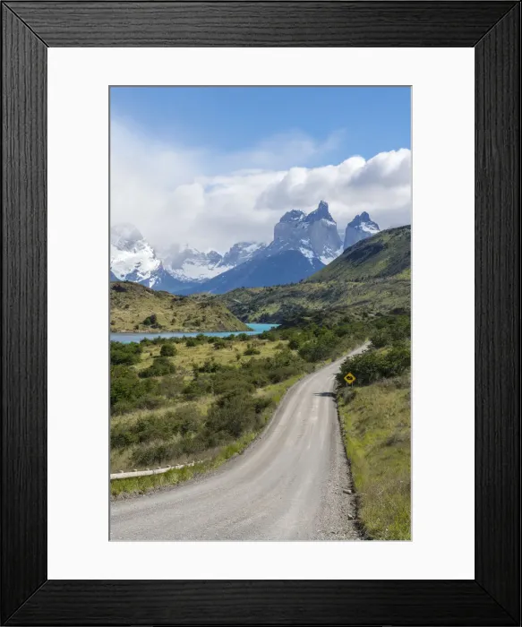 Framed Print : Dirt road and Lake Pehoa and Paine Horns in the background, in summer Framed Print : Dirt road and Lake Pehoa and Paine Horns in the background, in summer