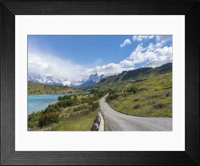 Framed Print : Dirt road and Lake Pehoa and Paine Horns in the background, in summer Framed Print : Dirt road and Lake Pehoa and Paine Horns in the background, in summer