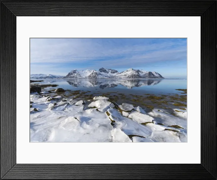 Framed Print : Ice on the beach with Limstrandtinden snowcapped group in the background Framed Print : Ice on the beach with Limstrandtinden snowcapped group in the background