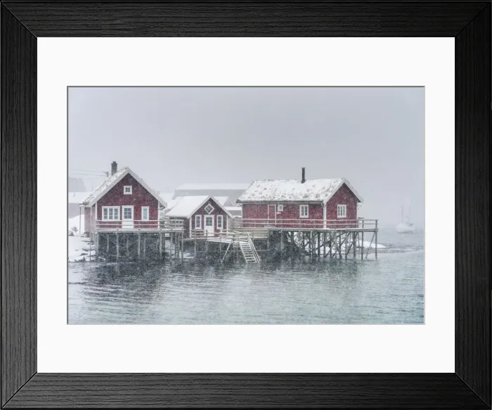 Framed Print : Traditional fishermen houses under the snow. Reine, Nordland, Northern Norway, Norway