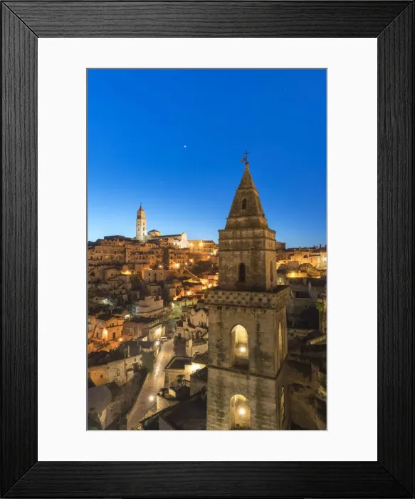 Framed Print : The Sassi quarter at dusk, with San Pietro Barisano bell tower in the foreground. Matera Framed Print : The Sassi quarter at dusk, with San Pietro Barisano bell tower in the foreground. Matera