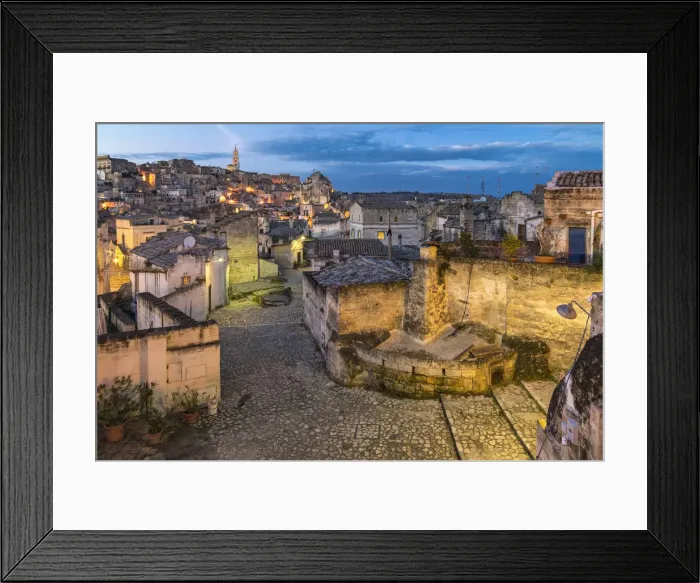 Framed Print : Typical paved alley in the old Sassi quarter at dusk. Matera, Basilicata region, Italy Framed Print : Typical paved alley in the old Sassi quarter at dusk. Matera, Basilicata region, Italy
