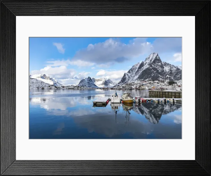 Framed Print : Boats in the harbour, with Olstinden peak in the background in winter Framed Print : Boats in the harbour, with Olstinden peak in the background in winter