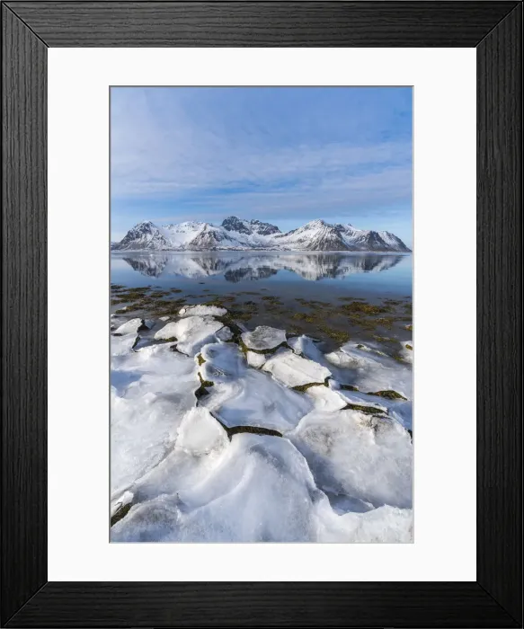 Framed Print : Ice on the beach with Limstrandtinden snowcapped group in the background Framed Print : Ice on the beach with Limstrandtinden snowcapped group in the background