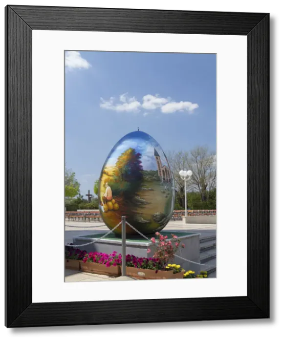 Framed Print : Europe, Bosnia and Herzegovina, Medjugorje. Easter egg in front of St. James Church Framed Print : Europe, Bosnia and Herzegovina, Medjugorje. Easter egg in front of St. James Church