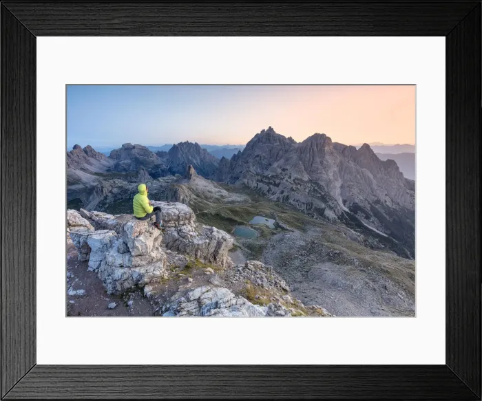 Framed Print : Hiker on the top of mount Paterno  /  Paternkofel looking the sunrise, Sexten Dolomites