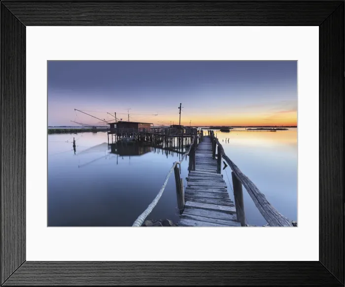 Framed Print : Europe, Italy, Emilia Romagna, Ferrara. Fishing huts on stilts in the valleys of Comacchio Framed Print : Europe, Italy, Emilia Romagna, Ferrara. Fishing huts on stilts in the valleys of Comacchio