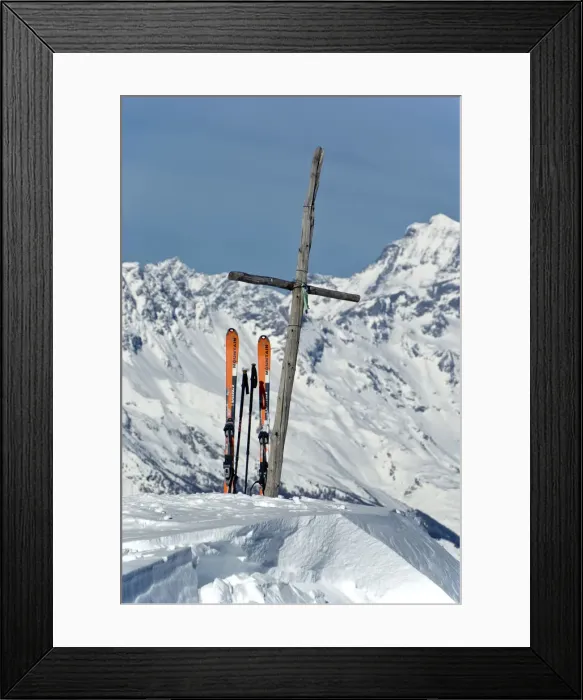 Framed Print : The wood cross on top of Pointe de la Pierre, flanked by a pair of mountaineering Framed Print : The wood cross on top of Pointe de la Pierre, flanked by a pair of mountaineering