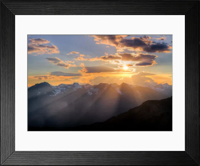 Framed Print : Plays of light at sunset through the clouds. Alps, Lombardy, Italy Framed Print : Plays of light at sunset through the clouds. Alps, Lombardy, Italy