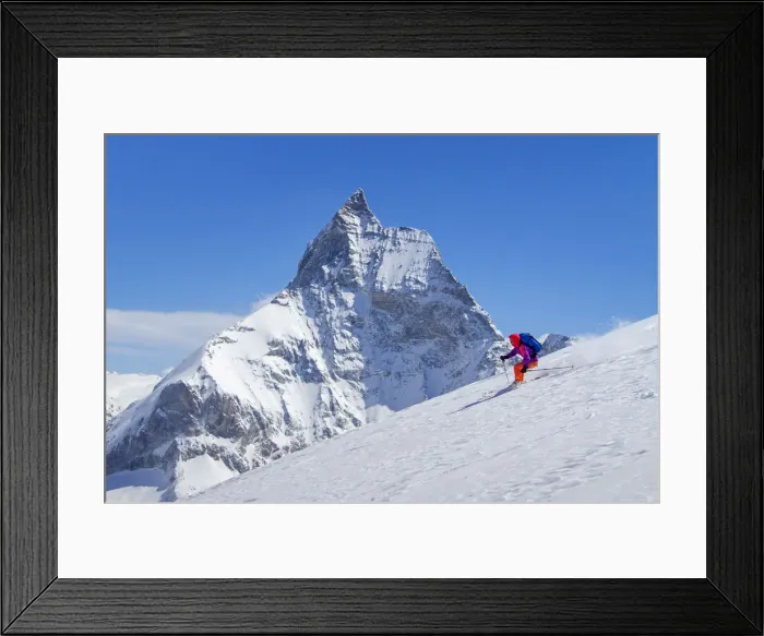 Framed Print : Skier and Matterhorn mountain in the background, Zermatt, Switzerland Framed Print : Skier and Matterhorn mountain in the background, Zermatt, Switzerland