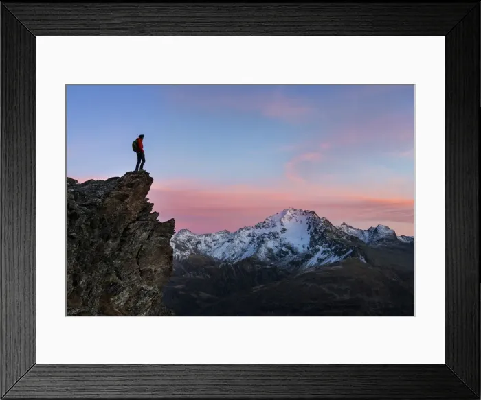Framed Print : An hiker on a rock in Viola valley with a panoramic view at sunset Framed Print : An hiker on a rock in Viola valley with a panoramic view at sunset