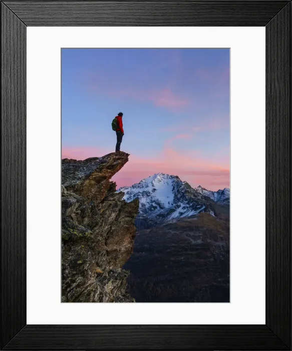 Framed Print : An hiker on a rock with a panoramic view at sunset. Valdidentro, Valtellina, Lombardy Framed Print : An hiker on a rock with a panoramic view at sunset. Valdidentro, Valtellina, Lombardy