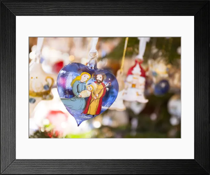 Framed Print : a close up image of a glass heart rappresenting the Holy Family in the Christmas market Framed Print : a close up image of a glass heart rappresenting the Holy Family in the Christmas market