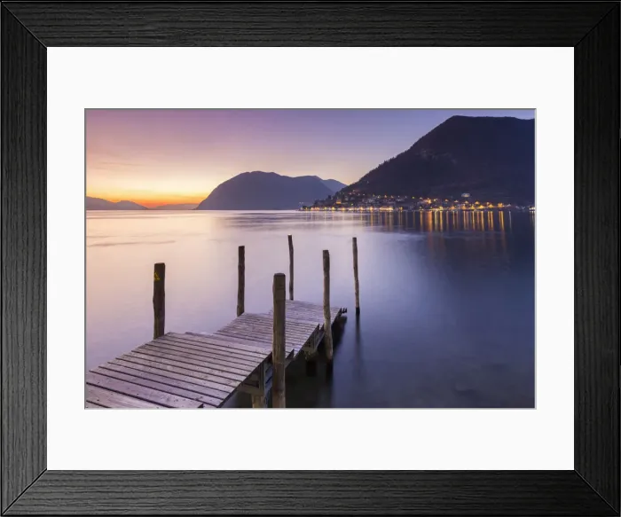 Framed Print : A pier in Sulzano, in front of Montisola and Peschiera Maraglio town during a winter Framed Print : A pier in Sulzano, in front of Montisola and Peschiera Maraglio town during a winter