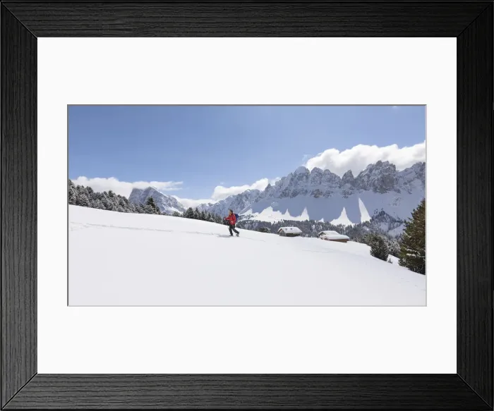 Framed Print : a hiker is walking with snowshoes into the Natural Park Puez Geisler with the Aferer Framed Print : a hiker is walking with snowshoes into the Natural Park Puez Geisler with the Aferer