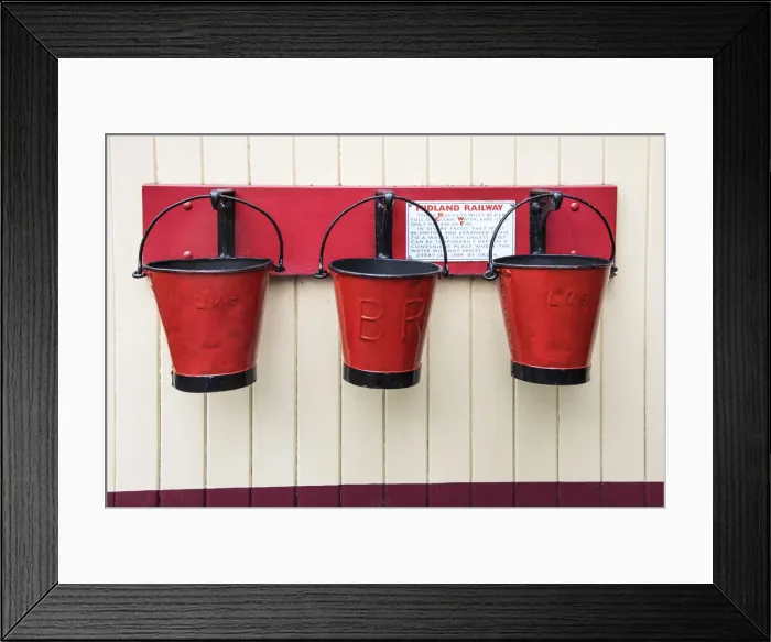 Framed Print : Old fire baskets at the Damems railway station, part of the Keighley and Worth Valley