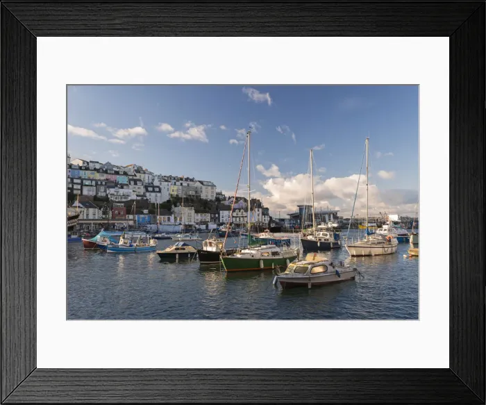 Framed Print : Boats on a sunny afternoon in Brixham harbour, Devon, England. Winter (March) 2016