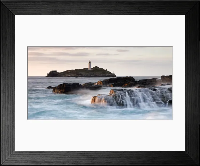 Framed Print : Waves crash over the rocks at Godrevy Point, looking out towards the lighthouse Framed Print : Waves crash over the rocks at Godrevy Point, looking out towards the lighthouse