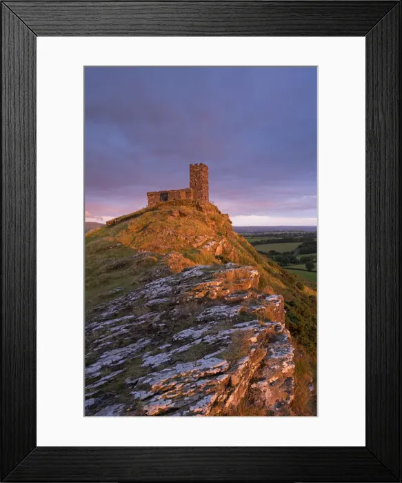 Framed Print : Rich evening sunlight illuminates Brentor Church in Dartmoor National Park, Devon Framed Print : Rich evening sunlight illuminates Brentor Church in Dartmoor National Park, Devon