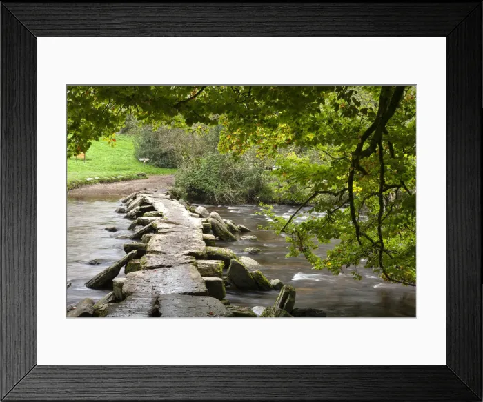 Framed Print : Ancient Tarr Steps clapper bridge crossing the River Barle in Exmoor National Park Framed Print : Ancient Tarr Steps clapper bridge crossing the River Barle in Exmoor National Park