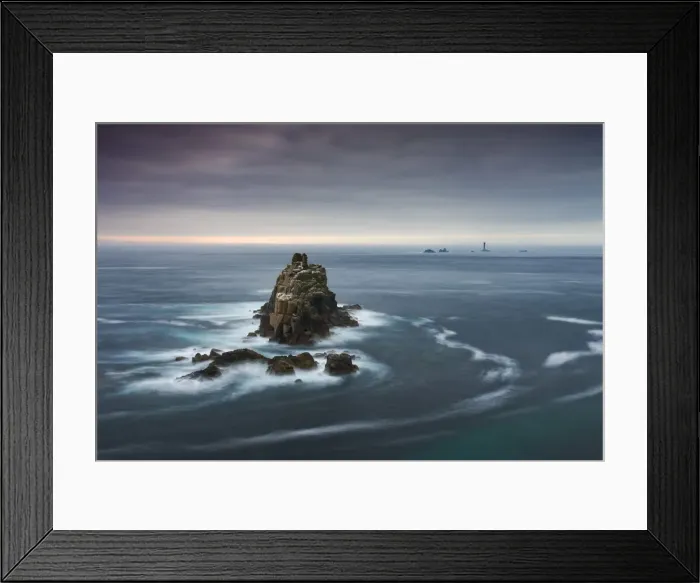 Framed Print : The Armed Knight rock stack and Longships Lighthouse off the coast at Lands End Framed Print : The Armed Knight rock stack and Longships Lighthouse off the coast at Lands End