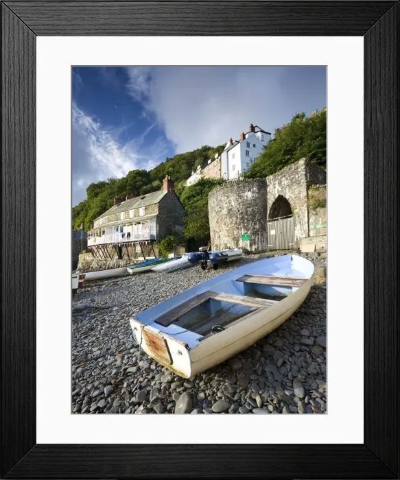 Framed Print : Fishing boat on the pebble beach in Clovelly harbour, Devon, England Framed Print : Fishing boat on the pebble beach in Clovelly harbour, Devon, England