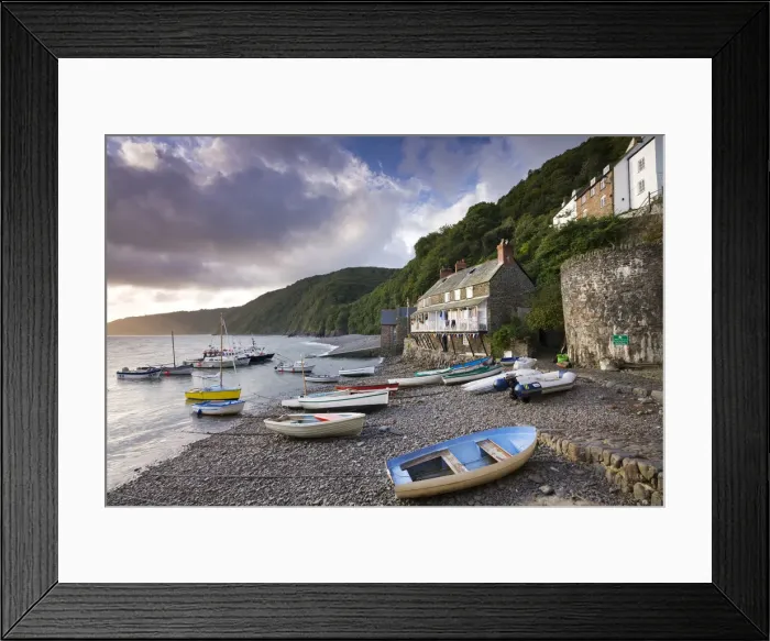 Framed Print : Fishing boats on the pebble beach in Clovelly harbour at dawn, Devon, England. Autumn