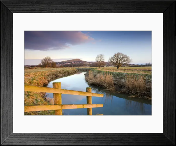 Framed Print : First light of morning on Glastonbury Tor viewed from the River Brue on the Somerset Framed Print : First light of morning on Glastonbury Tor viewed from the River Brue on the Somerset