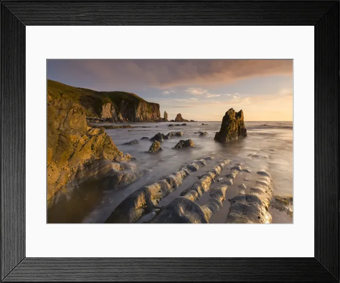 Framed Print : Rocky cove in golden evening light, Bantham Beach, South Hams, Devon, UK Framed Print : Rocky cove in golden evening light, Bantham Beach, South Hams, Devon, UK