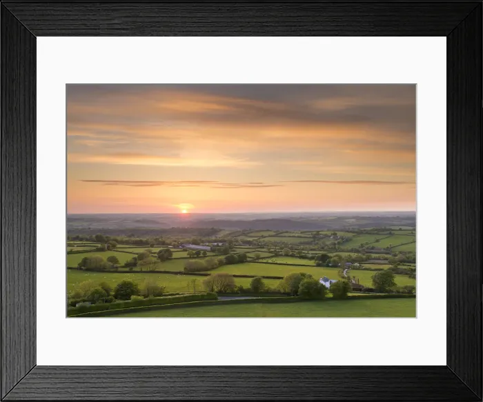Framed Print : Sunset over beautiful rolling Devon countryside, Devon, England. Summer (June) Framed Print : Sunset over beautiful rolling Devon countryside, Devon, England. Summer (June)