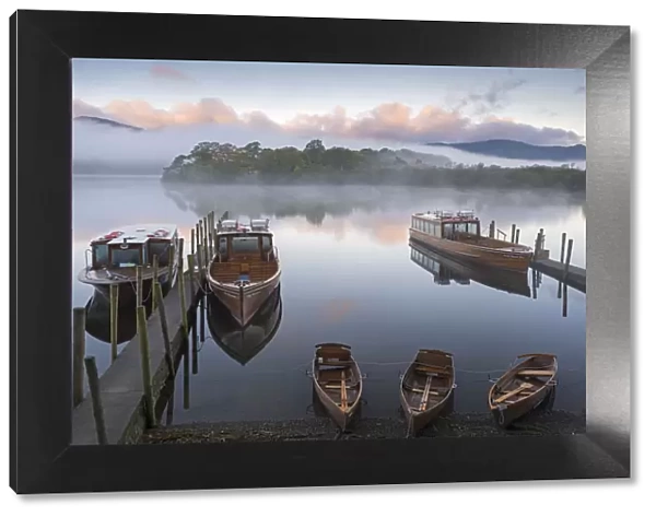 Boats on Derwent Water on a misty autumn morning, Lake District National Park, Keswick