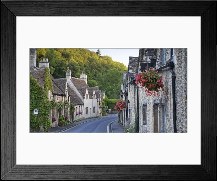 Framed Print : Pretty cottages in the picturesque Cotswolds village of Castle Combe, Wiltshire, England
