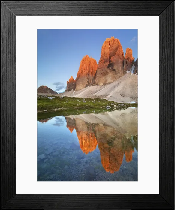 Framed Print : A waterhole its reflecting the Lavaredos Three Peaks, illuminated by Framed Print : A waterhole its reflecting the Lavaredos Three Peaks, illuminated by