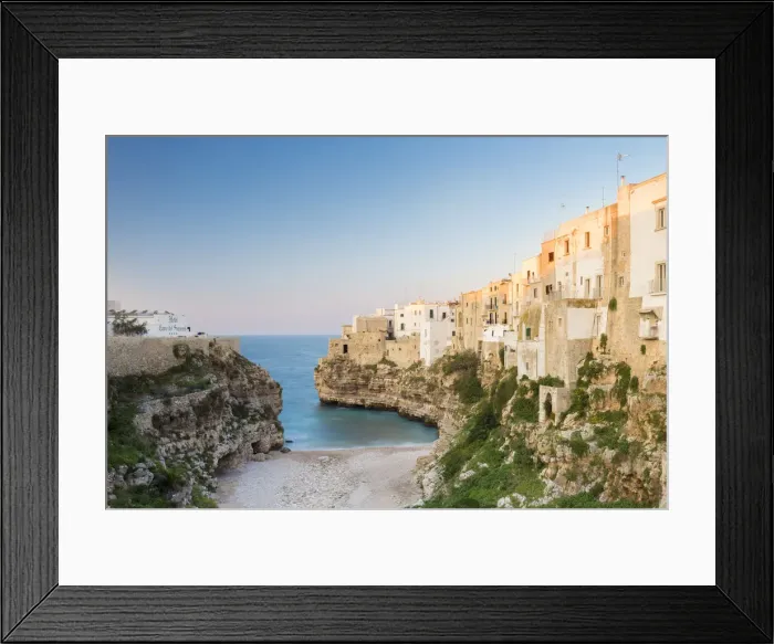 Framed Print : View of the cove Lama Monachile Cala Porto of Polignano a Mare at sunset. Bari district Framed Print : View of the cove Lama Monachile Cala Porto of Polignano a Mare at sunset. Bari district