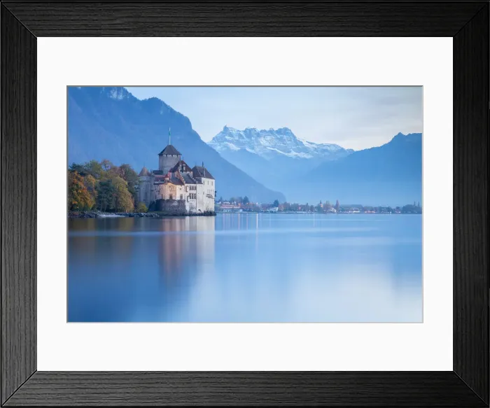 Framed Print : View of the Chillon castle on Lake Geneva and Dents du Midi at sunset. Veytaux, Montreux Framed Print : View of the Chillon castle on Lake Geneva and Dents du Midi at sunset. Veytaux, Montreux