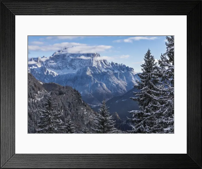 Framed Print : The north west side of Civetta mountain framed between some snowcapped trees in winter Framed Print : The north west side of Civetta mountain framed between some snowcapped trees in winter