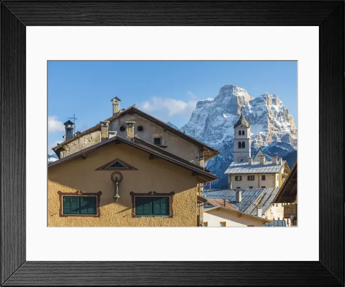 Framed Print : detail of the houses of the village of Colle Santa Lucia, in the background the bell Framed Print : detail of the houses of the village of Colle Santa Lucia, in the background the bell